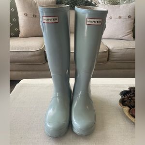 Hunter Women’s Original Tall Rain Boots. Light blue color. Slightly worn.
